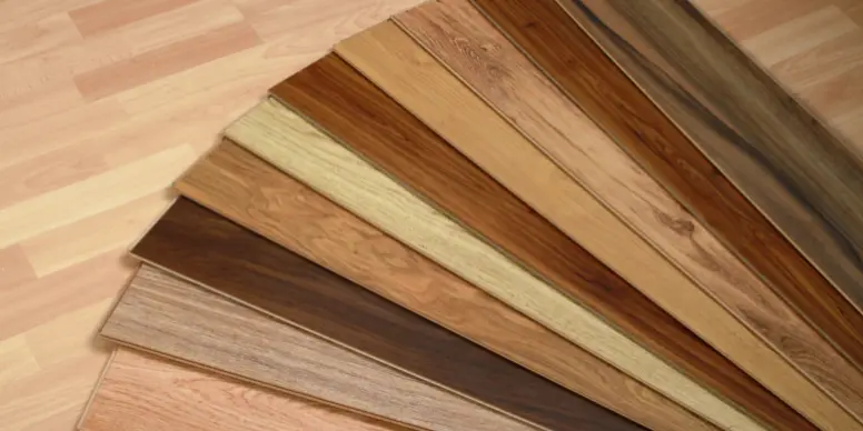 Fan of wood flooring samples in different species and stain colors